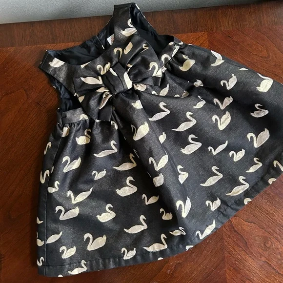 Cat & Jack black and gold swan patterned dress with bow front